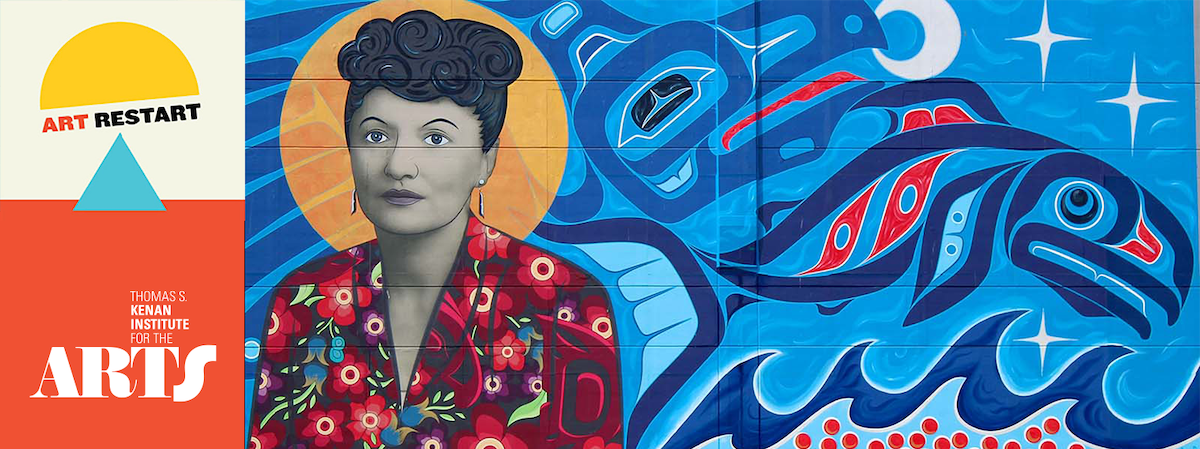 A mural of a woman in front of a blue, painted background. 