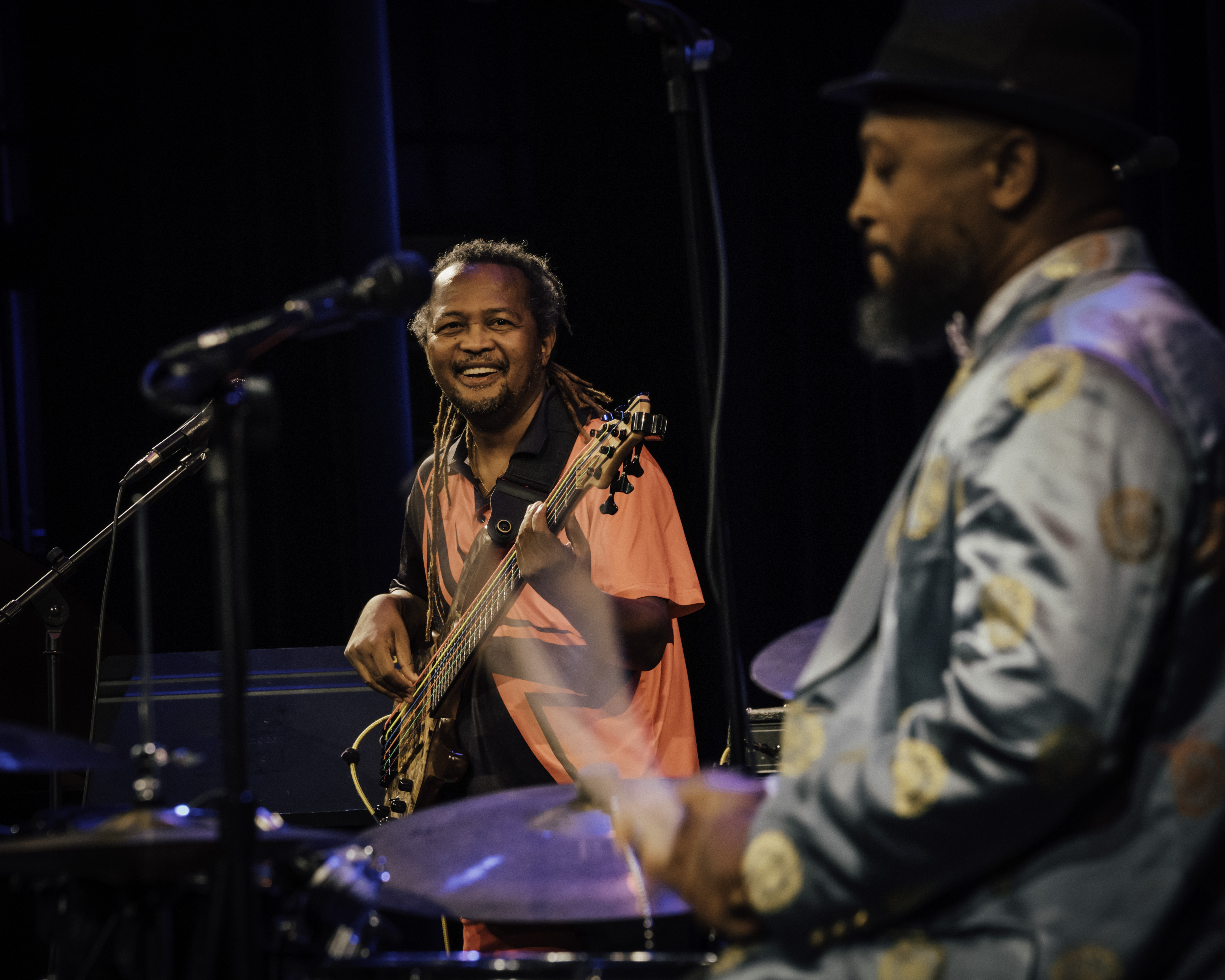 image of two men onstage playing instruments