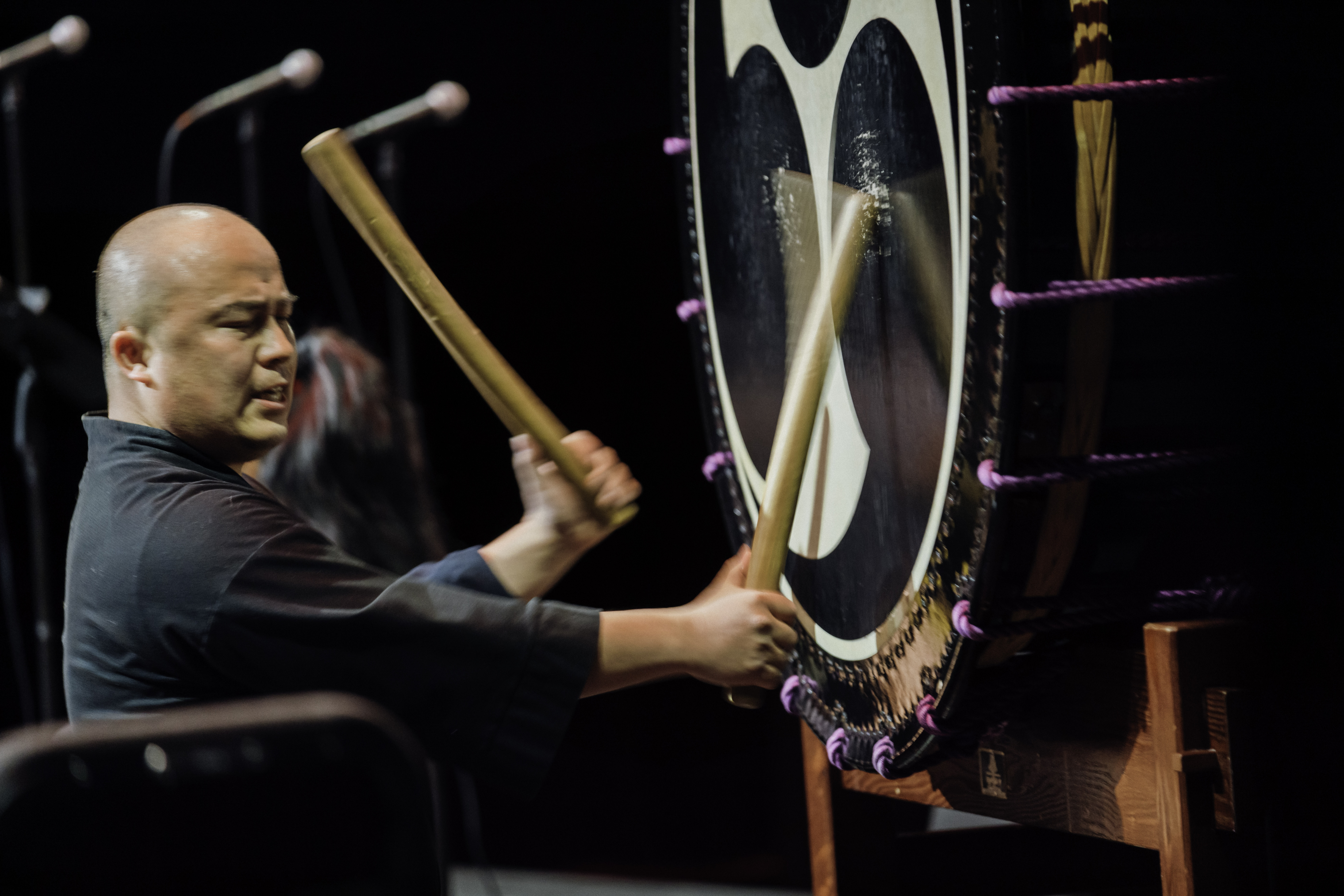 image of a man playing a percussion instrument onstage