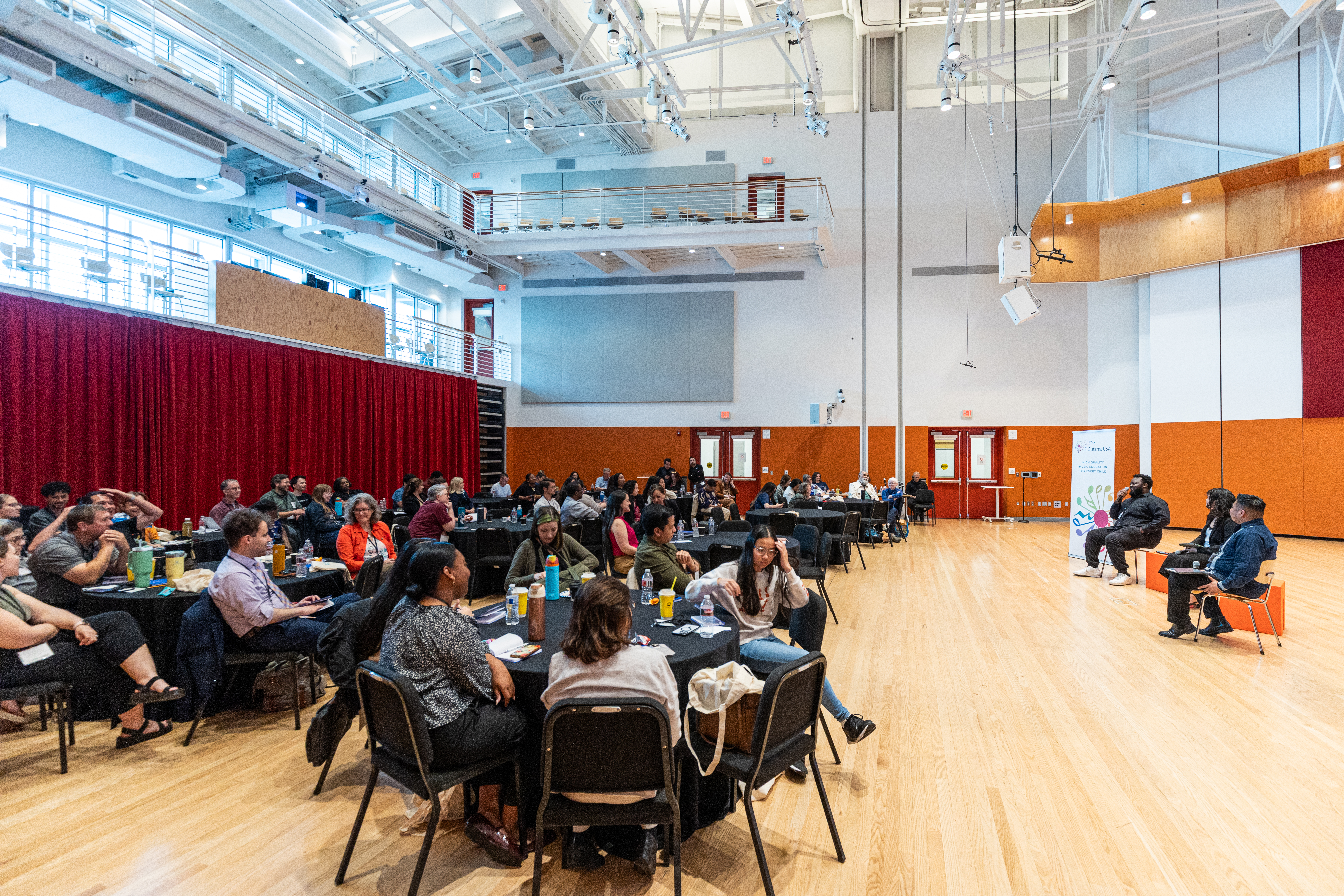 An Alumni panel presents at the 2025 West Coast Regional Gathering in LA at the Beckmen YOLA Center.
