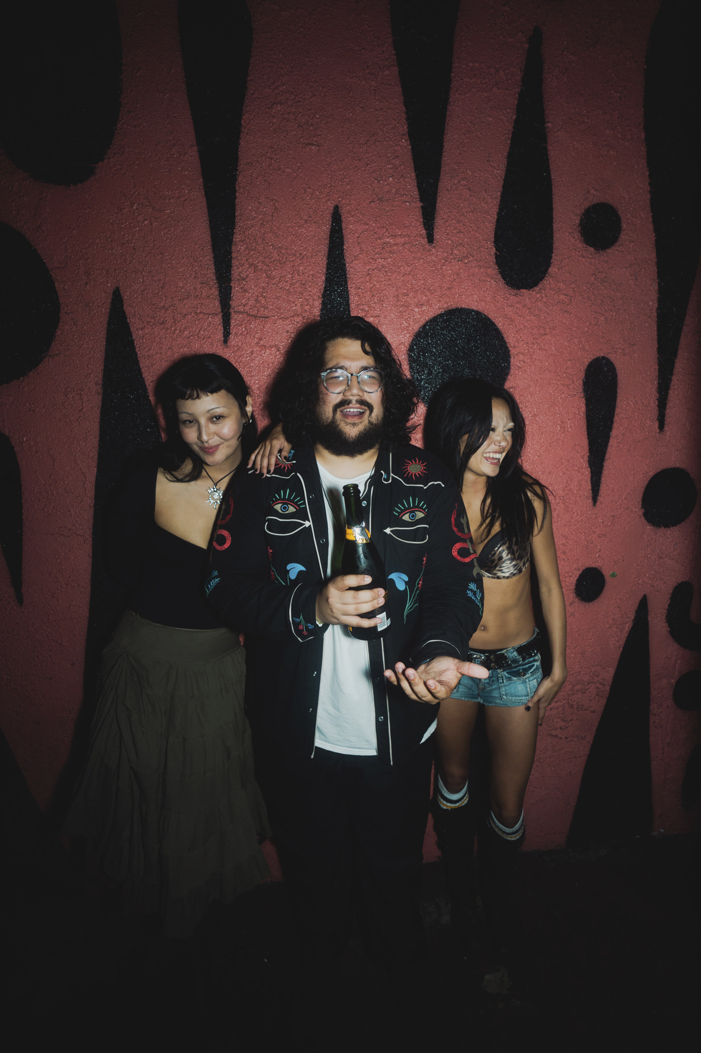 The 2025 Music Accelerator alums: Luna Li, Chance Emerson, and Snow Wife, celebrating after their show at our annual Live Nation Music Showcase in LA